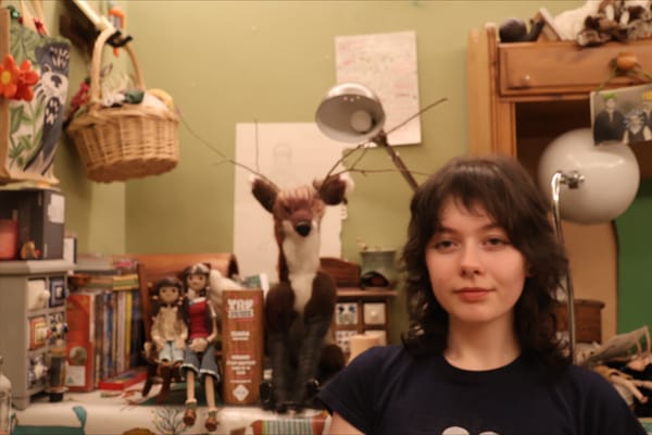 Eliana in her workshop with some of the puppets she used to make her award winning short