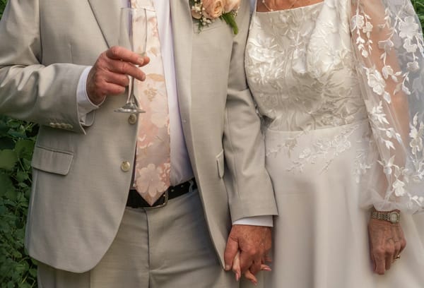 An elderly couple getting married